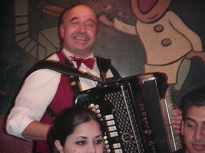 Man Singing In El Meson.jpg